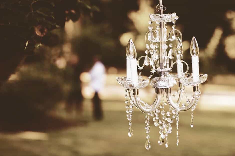 how to light outdoor space chandelier structure architectural feature gazebo